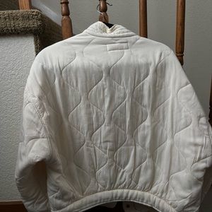 white quilted jacket